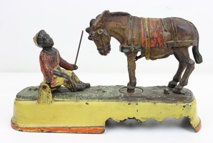 J & E Stevens Cast Iron Mechanical Bank