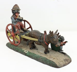 J & E Stevens Cast Iron Mechanical Bank