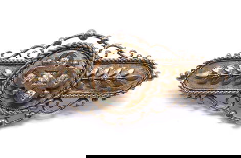 14k YG Diamond Pin: Victorian brooch engraved Louis Feret, dated 1887–1897, with a central quatrefoil cluster of old mine cut diamonds, and gold leaf motifs and wirework. .75"h x 1.75"w and 5.0dwt