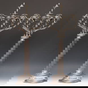 Neoclassical Silver Plate Candelabra: American silver plate pair of five-light candelabra with fluted stems rising from circular feet with gadrooning, beading, and chased floral, foliate, and geometric motifs, the scrolling snake skin arm