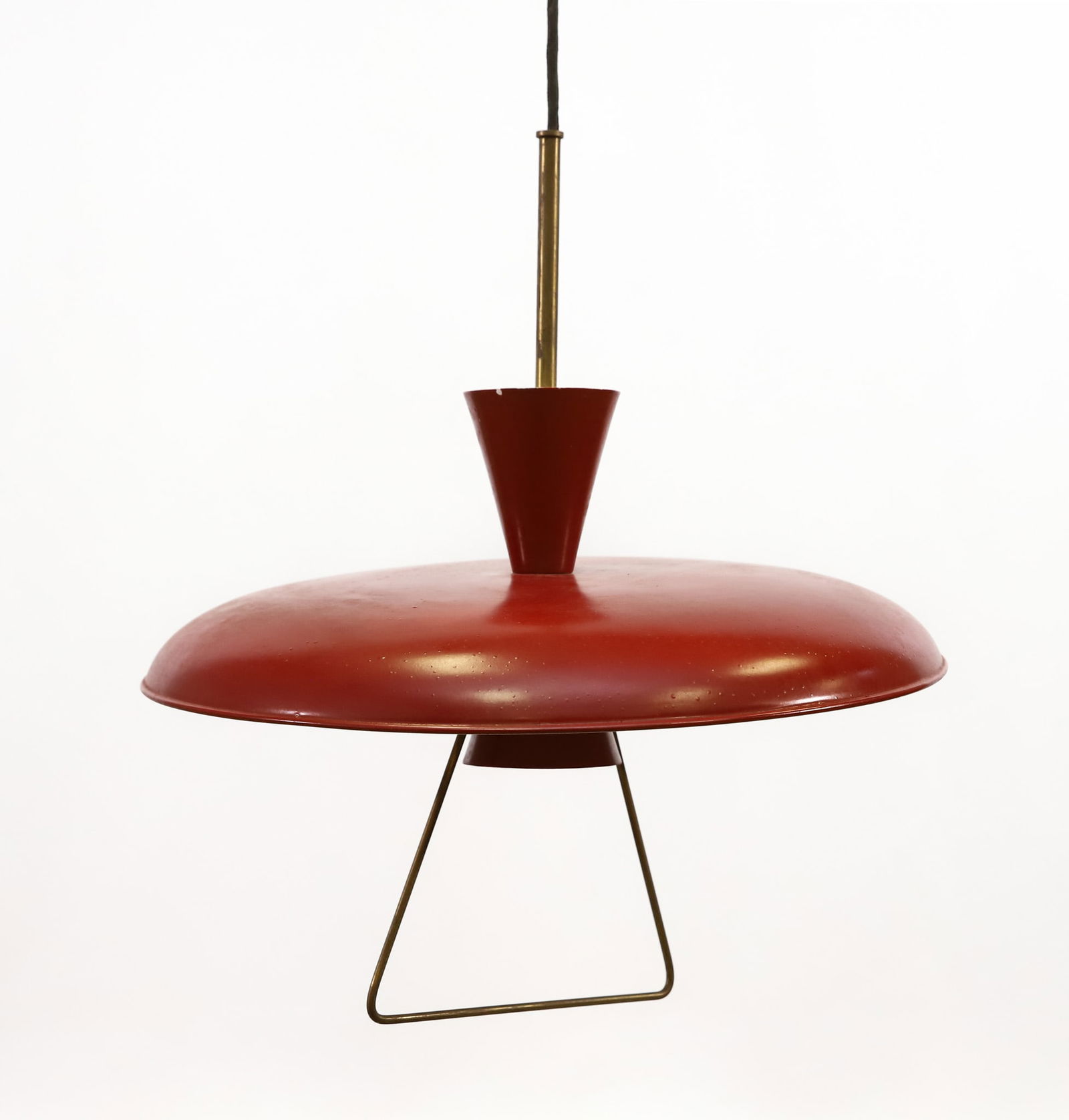 Counterweight Pendant Lamp: Enameled aluminum hanging light fixture in saucer form, with a red exterior and white interior, fitted with a brass counterweight for height adjustment, unmarked. The handle has a break to one side. N
