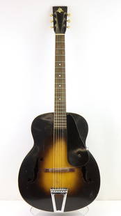 Favilla Archtop: 1930’s – 1940’s Favilla Archtop. Rare guitar! Favilla guitars did not produce many archtops. Fine example with sunburst finish, unique F hole carving. Vintage, period tuning machines. Original,