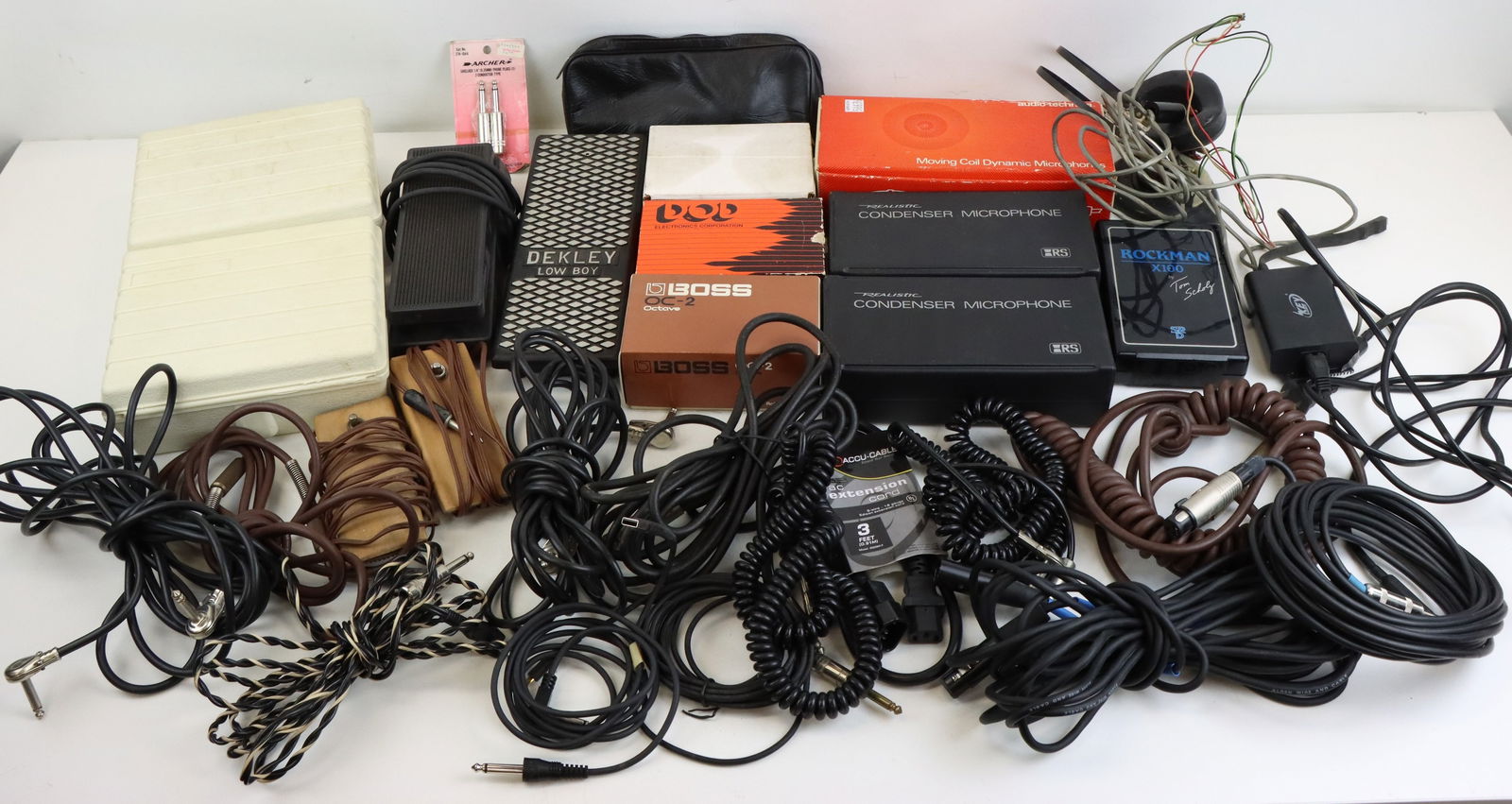 Box of Microphones and Accessories: Box of Microphones and Accessories Including: 12 Plus Cables, Wires, Switches and Adapters; Boss OC-2 Octave Pedal, DOD Fet Preamp, Shure PE35H Mic, Sholz Rockman, Audio Technica AT816-2 Mic, 2x Reali