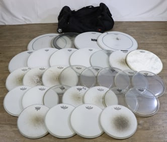 30 Plus Assorted Drum Heads with Wheeled Accessory Bag