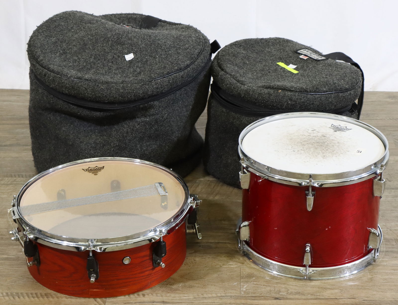 Yamaha 14" Snare and 13" Tom Drums with Fuzzee Padded Bags.: Yamaha 14" Snare Needing Repair. 13" Tom-tom in PLayable Condition and 2 "Fuzzee" Brand Padded Drum Bags in Good Used Condition. Largest bag (broken zipper) 14"h x 17"dia