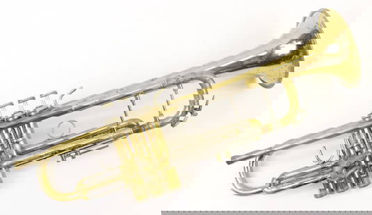 Vincent Bach Stradivarius Model 25 Trumpet with Case: Vincent Bach Stradivarius Model 25 Bb trumpet featuring a lacquered brass finish. Includes original hard-shell case lined with blue velvet, labeled by Giardinelli Band Instrument Co., New York. The ca
