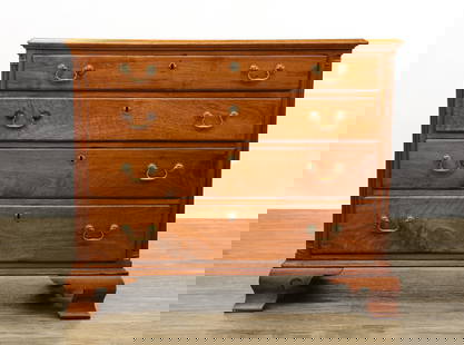 Philadelphia Chippendale Chest of Drawers: Walnut case, chamfered edge top, four graduated dovetail drawers, on ogee bracket feet. One drawer is missing the escutcheons to the pull. 34.5"h x 40.5"w x 20.5"d