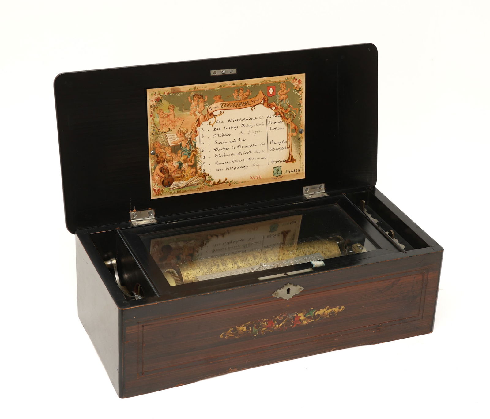 Swiss Cylinder Music Box: No. 16839, plays 8 tunes, brass cylinder, rosewood case with marquerty and banded inlay. Currently not in working condition. 5.5"h x 16"w x 7"d