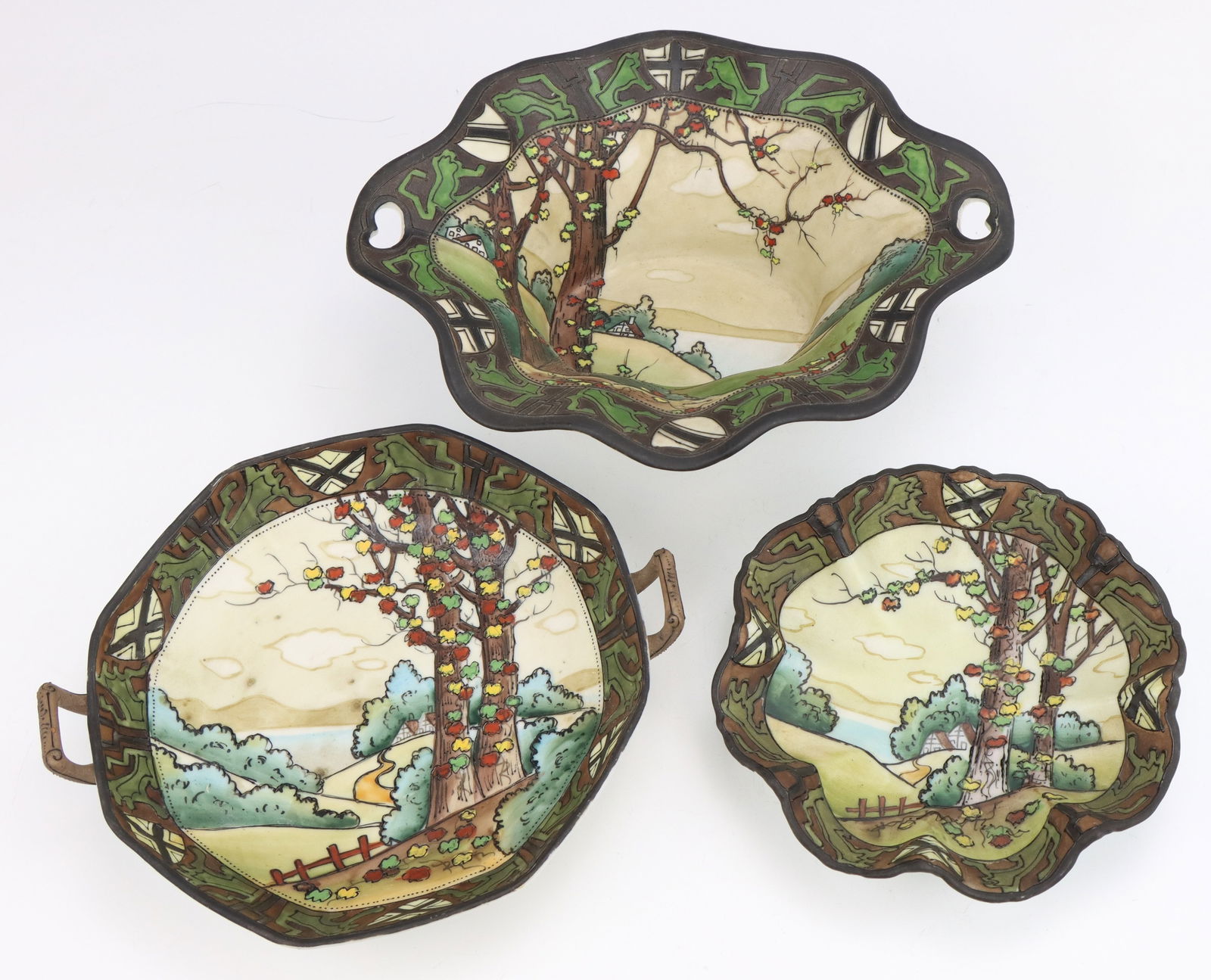 Nippon Dark Woodland: Nippon Dark Woodland porcelain bowls (3, varying styles), c. 1891-1921, hand painted moriage decoration, marked, 3"h x 8"w x 6.75"d.