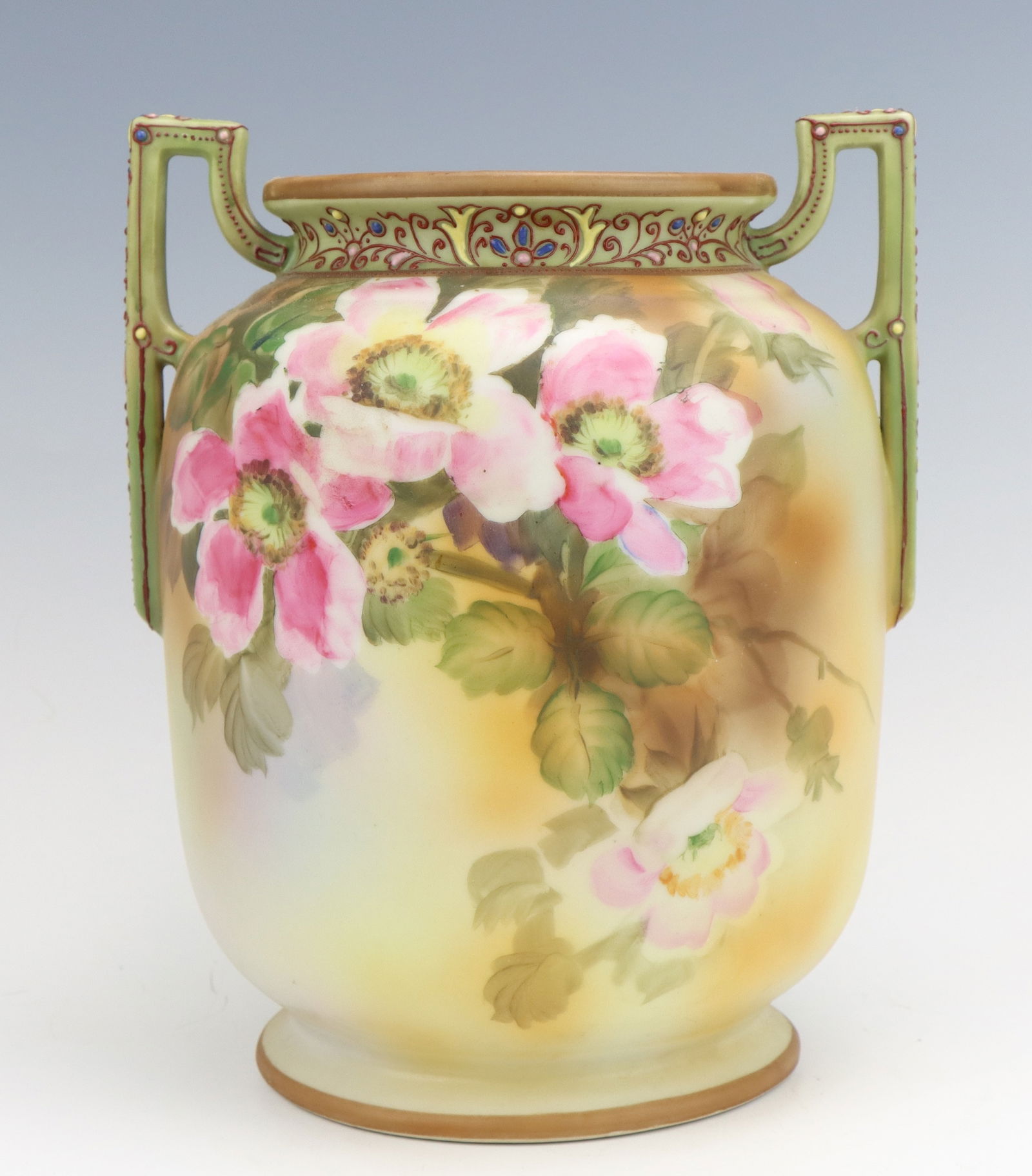 Nippon Porcelain Vase: Nippon porcelain vase, hand painted, moriage decorated vase opening and handles, marked, 8.75"h x 7"w x 6.25"d.