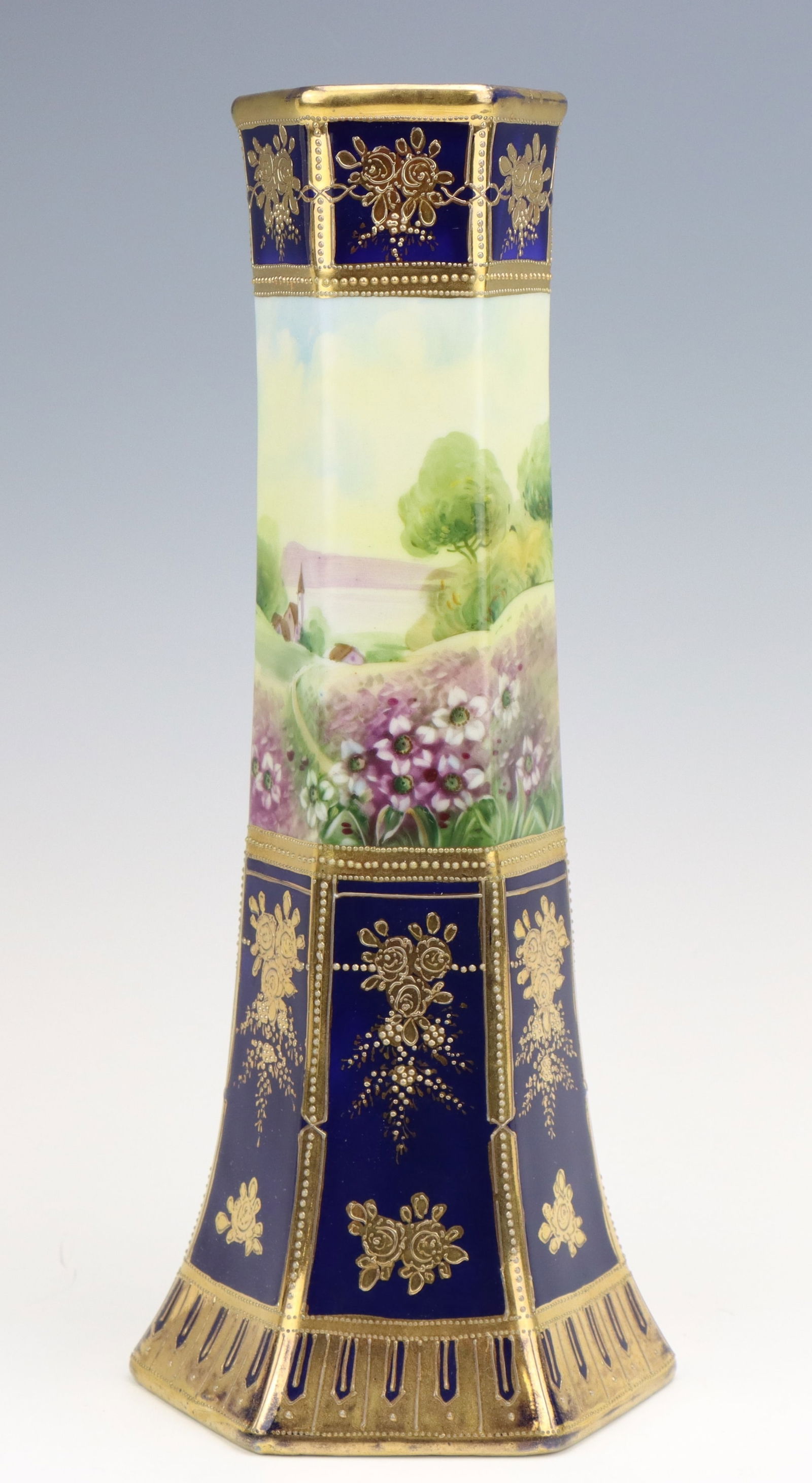 Nippon Porcelain Vase: Nippon porcelain vase, c. 1891-1921, hand painted landscape scene, cobalt with moriage decoration, marked, 12"h x 5"w x 4.5"d.