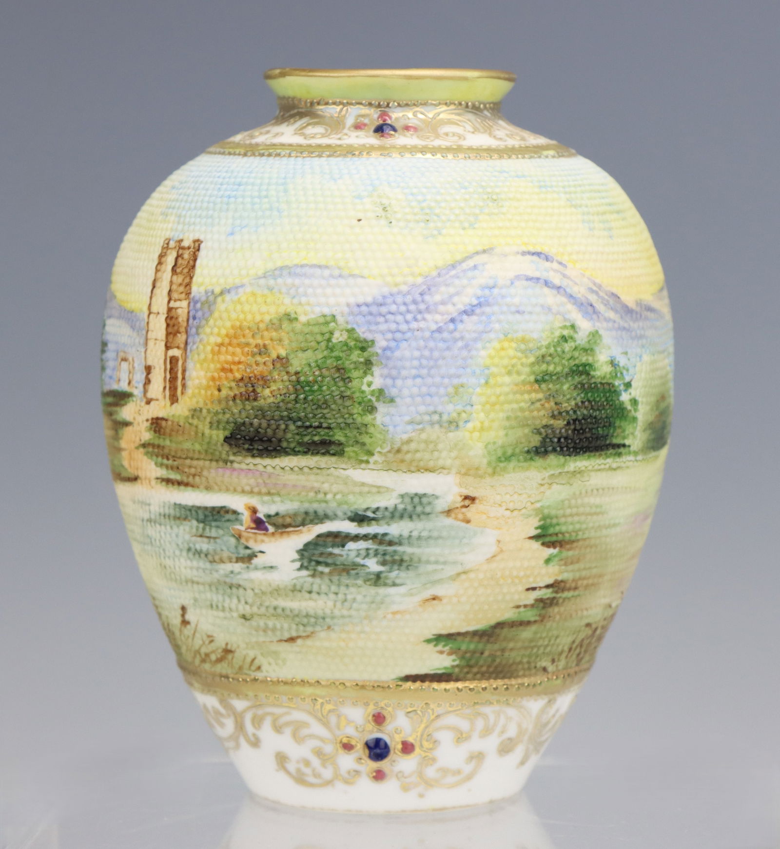 Nippon Tapestry Vase: Nippon tapestry porcelain vase, hand painted, landscape scene, moriage and jeweled decoration, marked, 5"h x 4"dia.