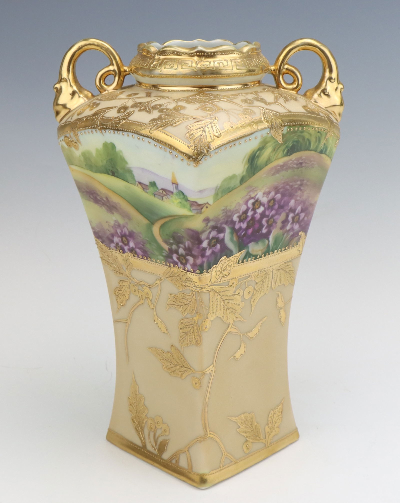 Nippon Porcelain Vase: Nippon porcelain vase, c. 1891-1921, hand painted landscape scenes with gilt moriage decoration, marked, 10"h x 6.75"w x 6.75"d.