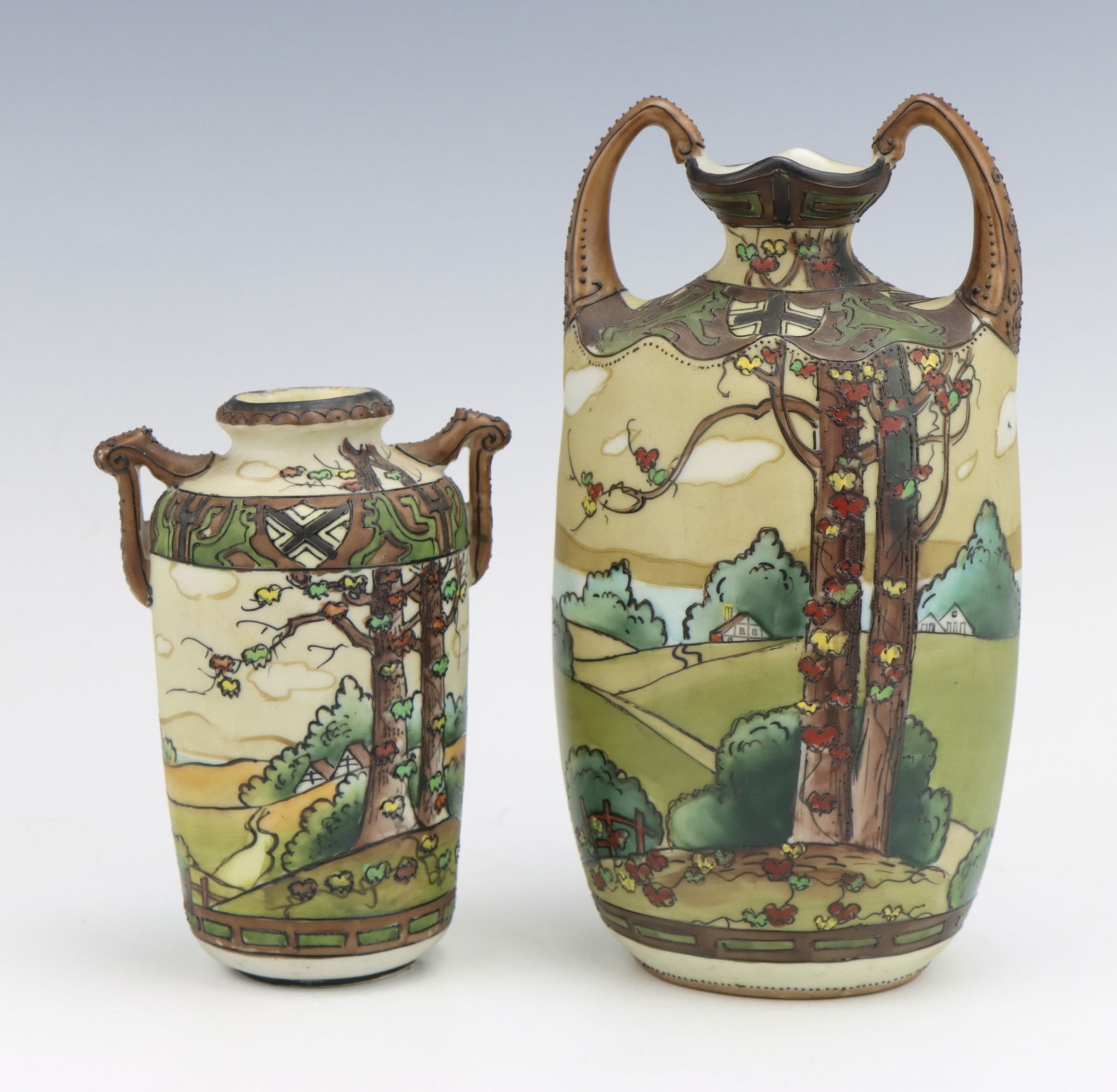 Nippon Dark Woodland Vases: Nippon Dark Woodland porcelain vases (2), c. 1891-1921, hand painted moriage decoration, marked, largest 7.5"h x 3.75"w x 3"d.