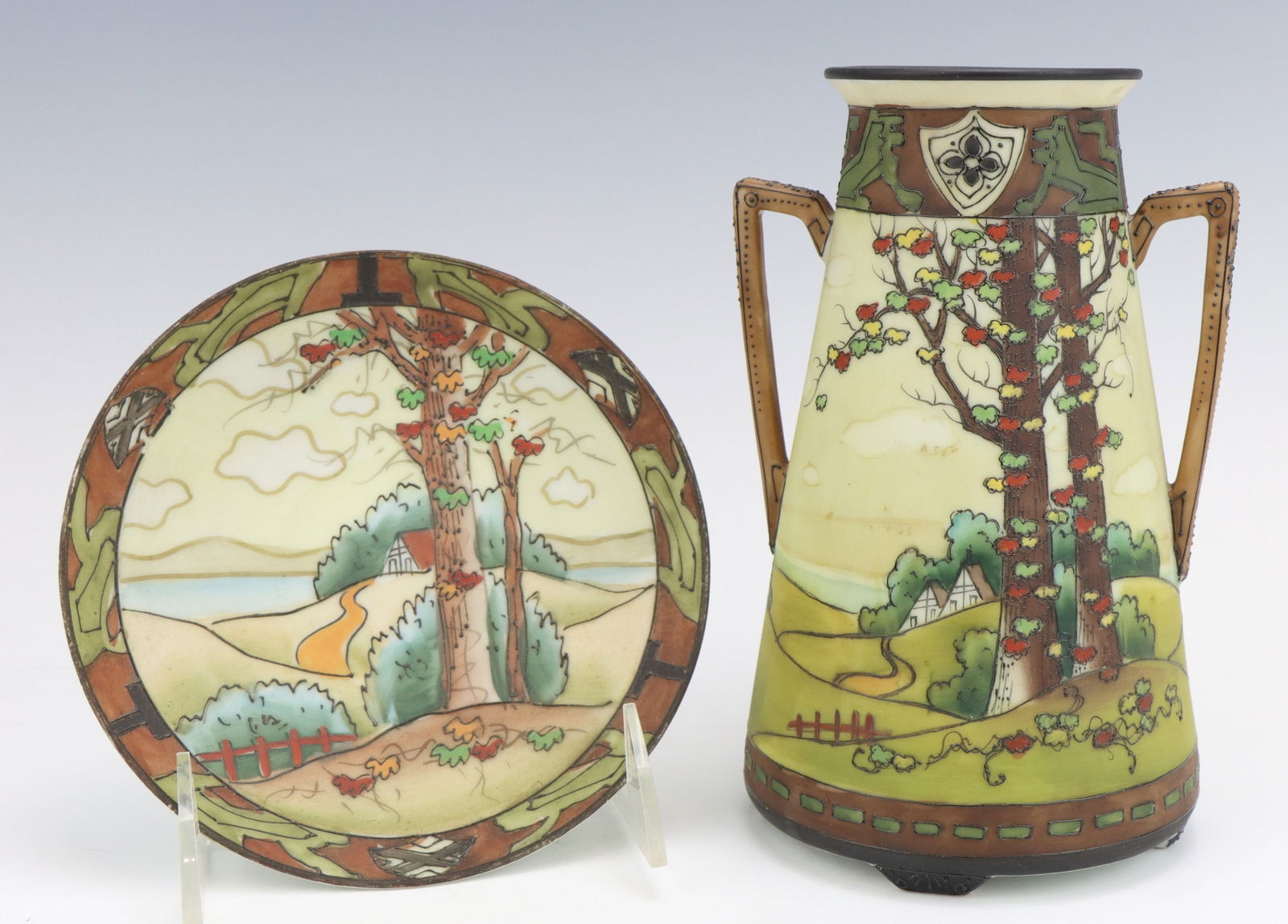 Nippon Dark Woodland: Nippon Dark Woodland porcelain vase and plate, c. 1891-1921, hand painted moriage decoration, marked, vase 6.5"h x 4.25"w x 4"d.