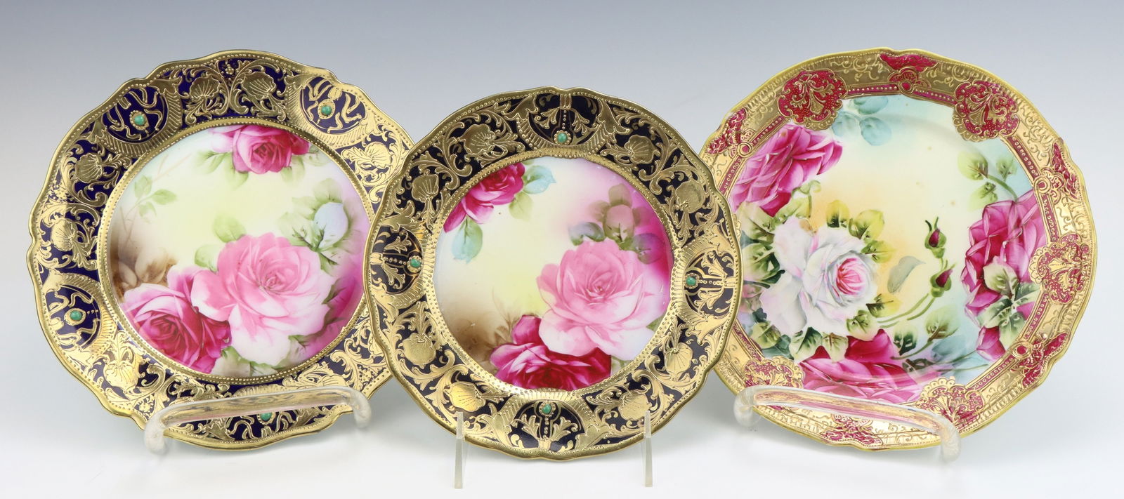 Nippon Porcelain Plates: Nippon porcelain plates (3), hand painted floral motifs, moriage gilt decorative details, largest plate 8.75"dia.