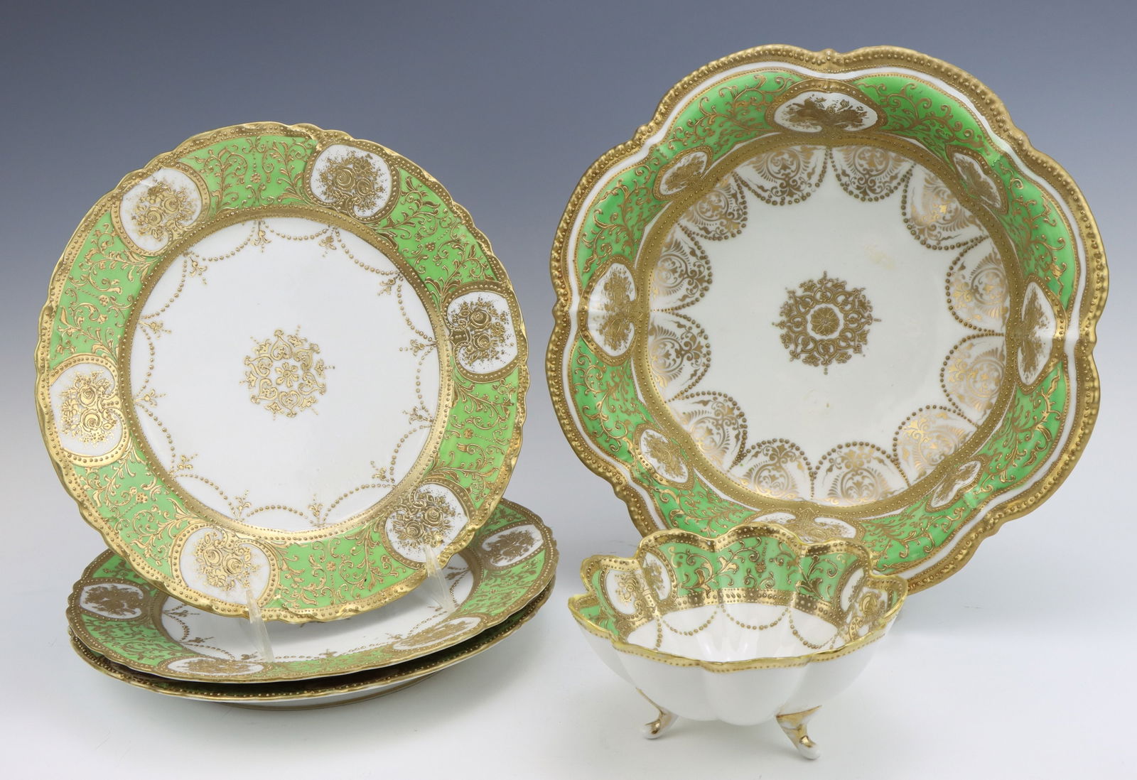 Nippon Porcelain: Nippon porcelain serving bowl, footed bowl and plates (3), c. 1891-1921, hand painted moriage decoration, marked, large bowl 3"h x 11.5"dia, plate 10"dia.