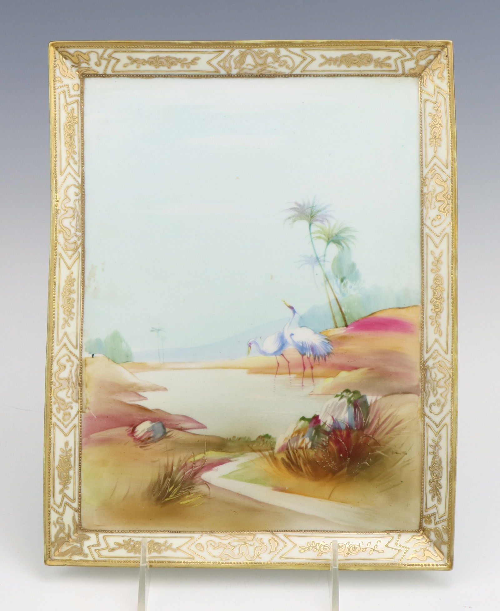 Nippon Dresser Tray: Nippon porcelain dresser tray, c. 1891-1921, hand painted seaside scene with moriage decoration, marked, 10.5"h x 8.25"dia.