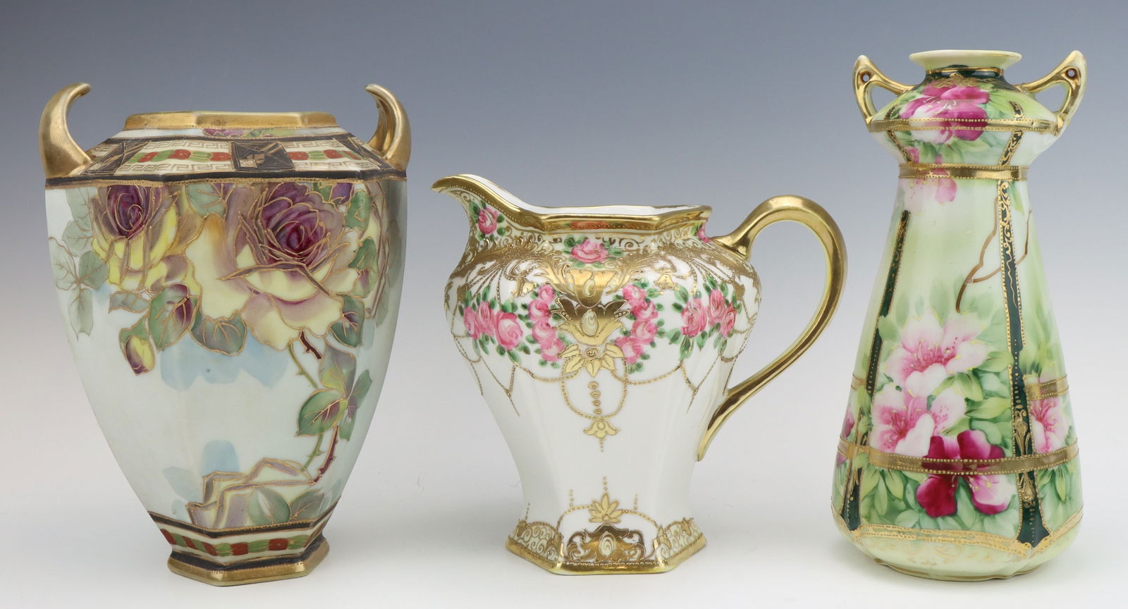 Nippon Porcelain: Nippon porcelain vases (2) and pitcher, c. 1891-1921, hand painted with moriage decoration, marked, largest 8.5"h x 6.5"w x 5.5"d.
