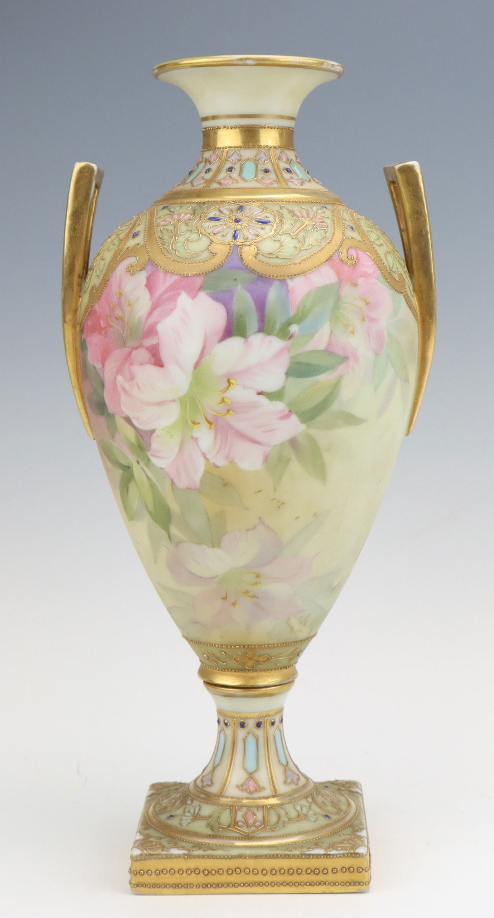 Nippon Porcelain Vase: Nippon porcelain pedestal vase, c. 1891-1921, hand painted gilt moriage decoration, marked, some wear to paint on handles and rim, 11.5"h x 5.5"w x 4.75"d.