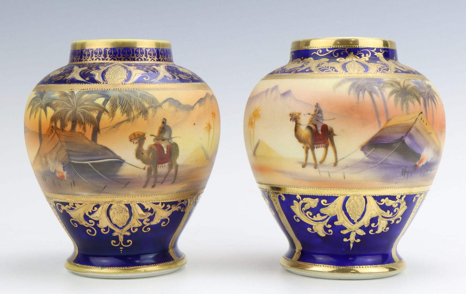 Noritake Porcelain Vases: Noritake porcelain vases (2), Egyptian desert, cobalt, marked, each 5.25"h x 4.5"dia.