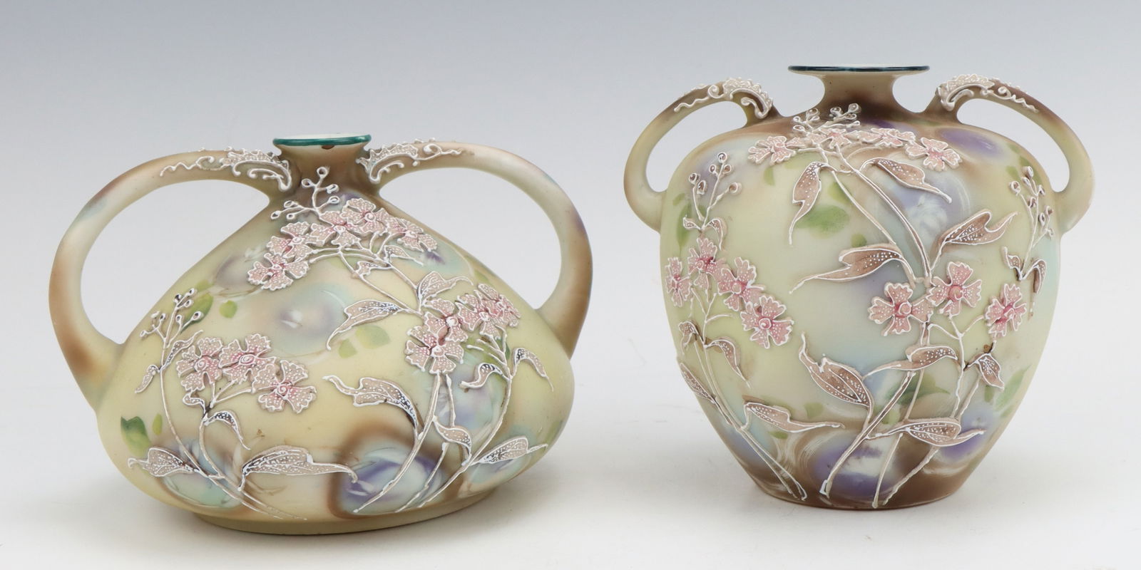 Nippon Porcelain Vases: Nippon porcelain vases (2), hand painted floral motif with moriage decoration, marked, larger 4"h x 4.75"w x 4"d.