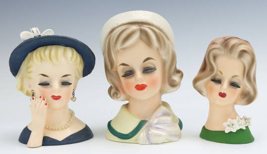 D.A.B.S., Napcoware & Inarco Lady Head Vases: D.A.B.S. lady head vase with pill box hat. Napcoware lady head vase, marked, some paint wear on nose. Inarco lady head, marked and labeled, earrings included, they have been reattached. largest vase 5