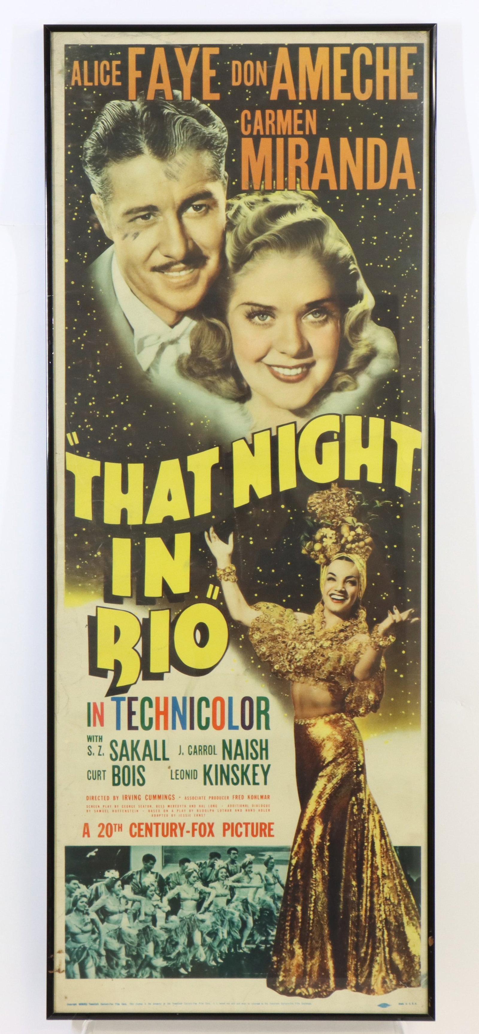 Carmen Miranda Original Movie Poster: Original "That Night in Rio" 1941 movie poster featuring Carmen Miranda, Don Ameche, Alice Faye, framed, some wear and color fading. 36.25”h x 14.25”w framed