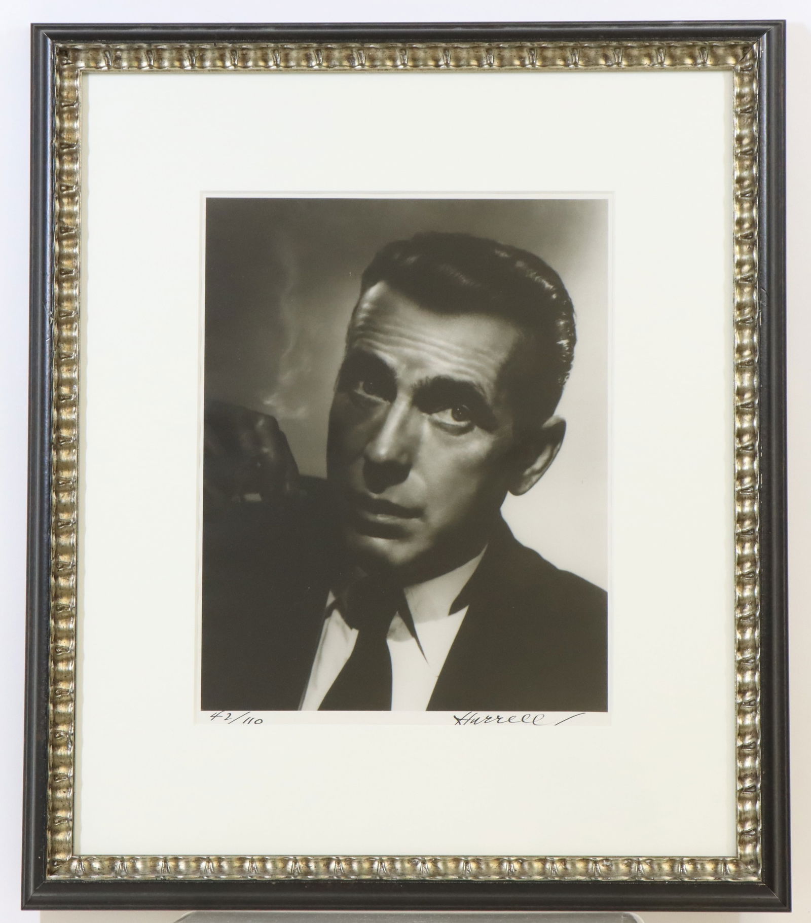 George Hurrell Bogart Photograph Portrait: George Hurrell Humphrey Bogart photo portrait, 42/100, signed, includes COA and ephemera, framed. 23”h x 19.75”w framed