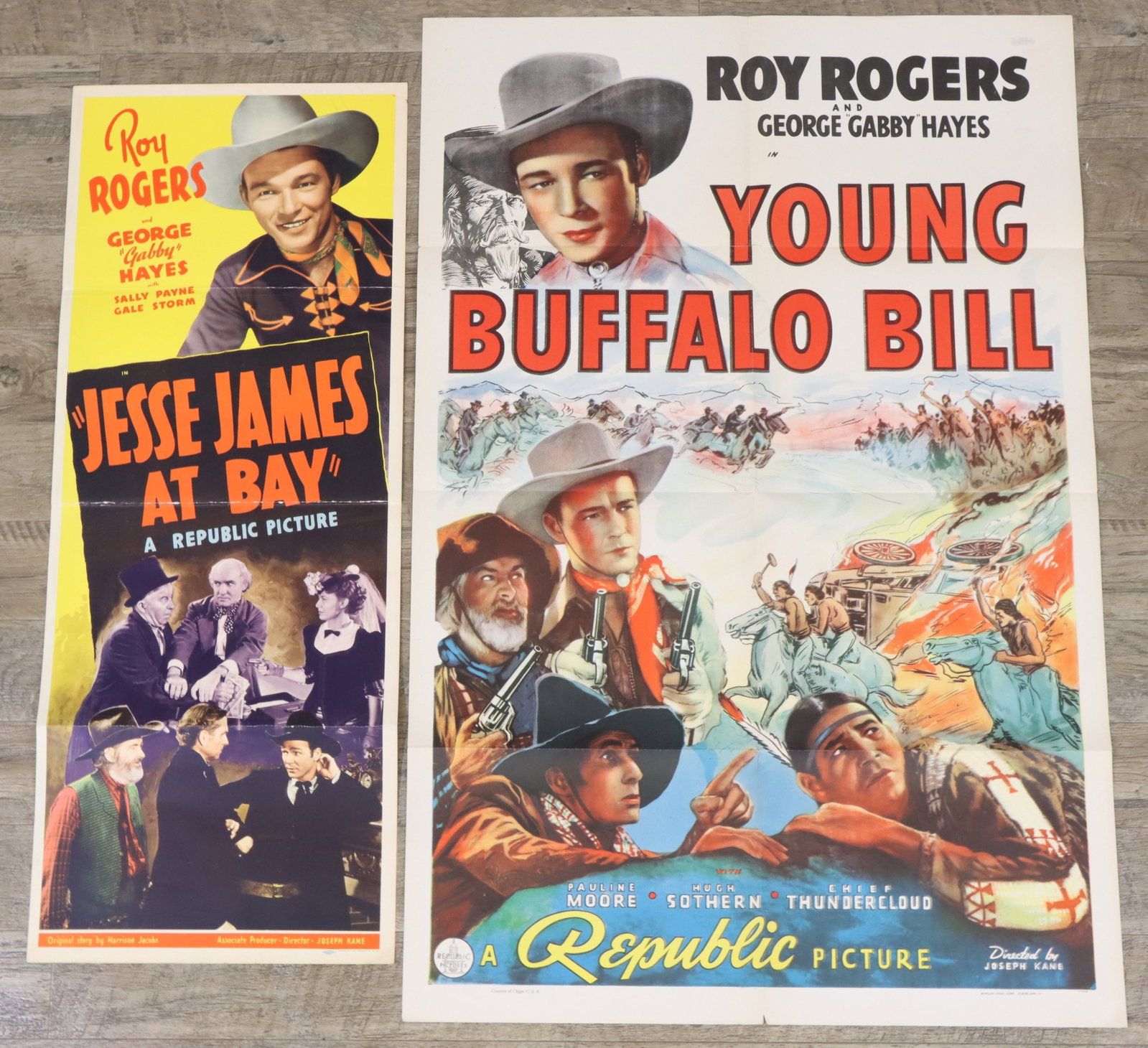 Roy Rogers Movie Posters: Roy Rogers movie posters (2), includes Young Buffalo Bill (1940) and Jesse James at Bay (1941), some wear and fading. larger 41”h x 27”w