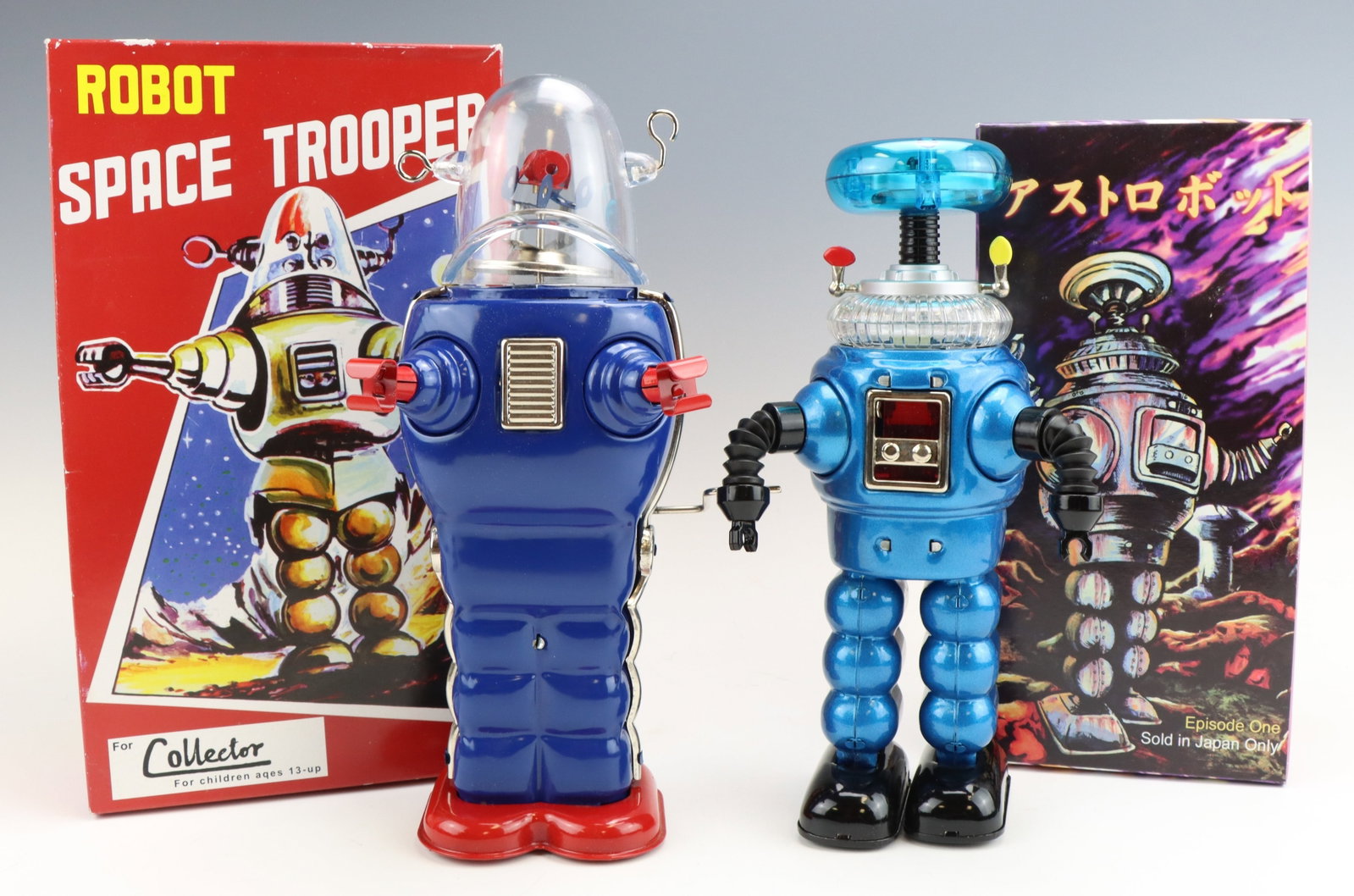 Lost in Space Robot and Space Trooper: Lost in Space robot and Robot Space Trooper. Both are wind-up functional with original boxes. Largest box measures 4.5”h x 6”w x 10.25”d