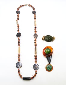 Beaded Necklace with Bakelite and Metal Brooches