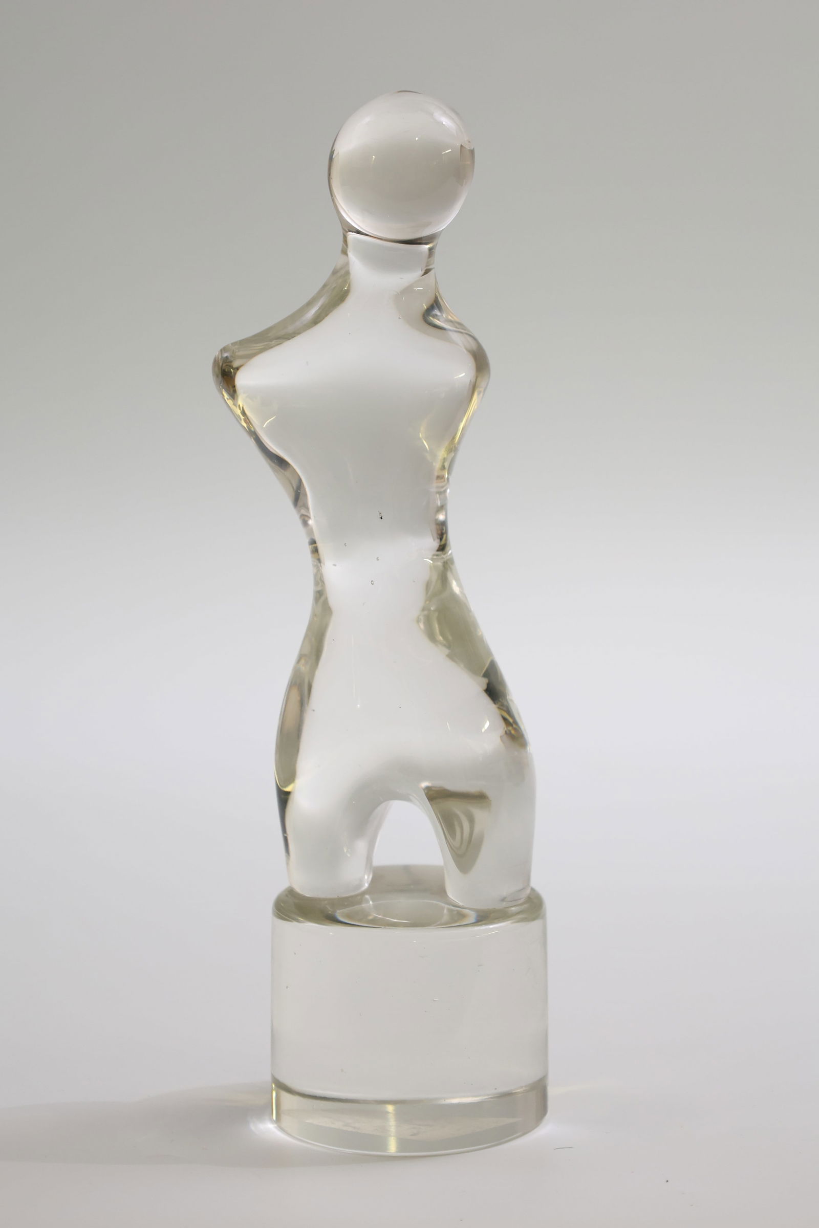 Attr. Ermanno Nason (1928 – 2013): Italian blown glass sculpture, an abstract female form after Jean Arp, attributed to Ermanno Nason for Cenedese. Unmarked/unlabeled. 10.75"h x 2.75"w