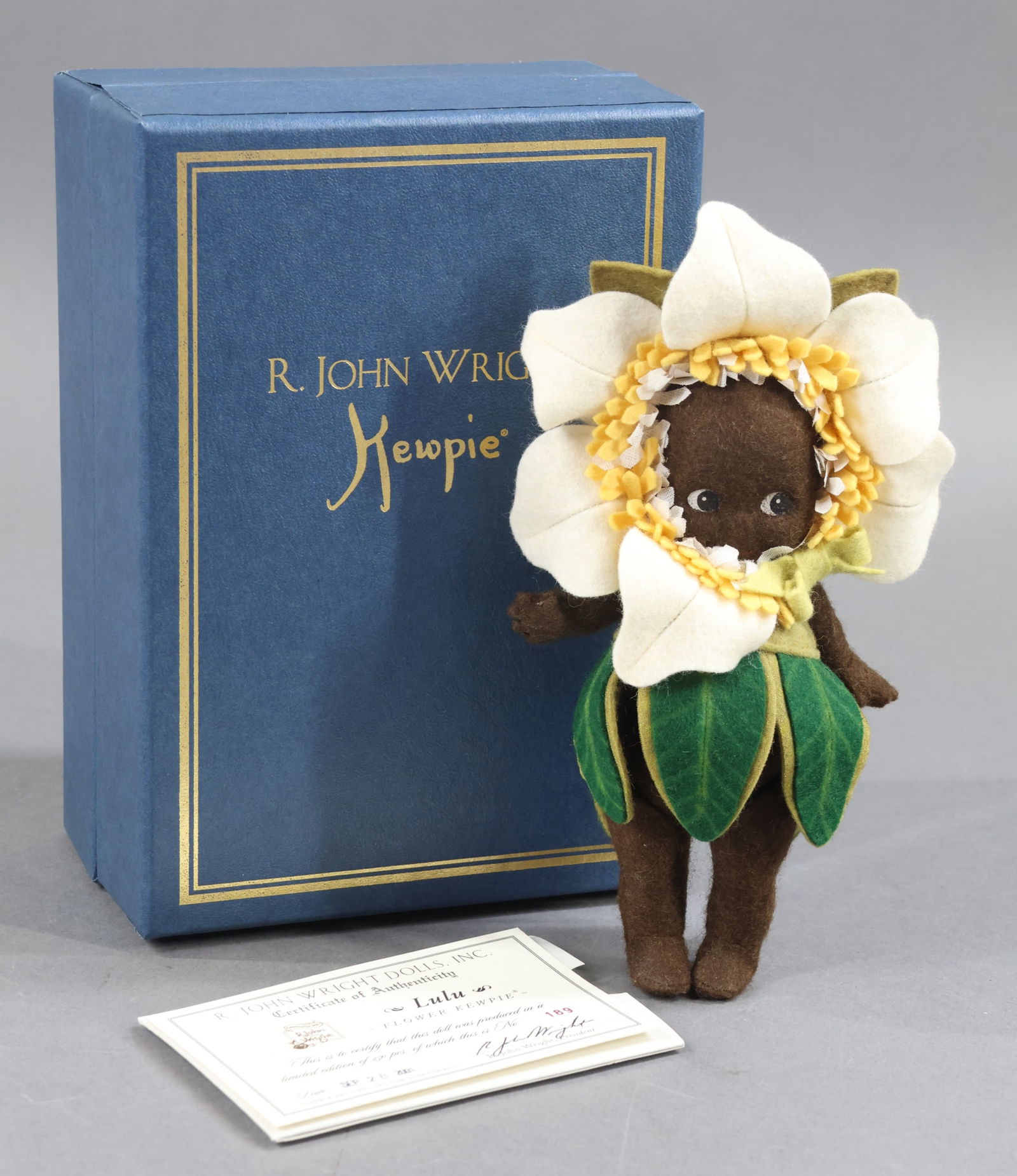 R. JOHN WRIGHT: MIB 7" 2001 Flower Kewpie - "Lulu", 189/250. COA. This lot is being sold AS IS.