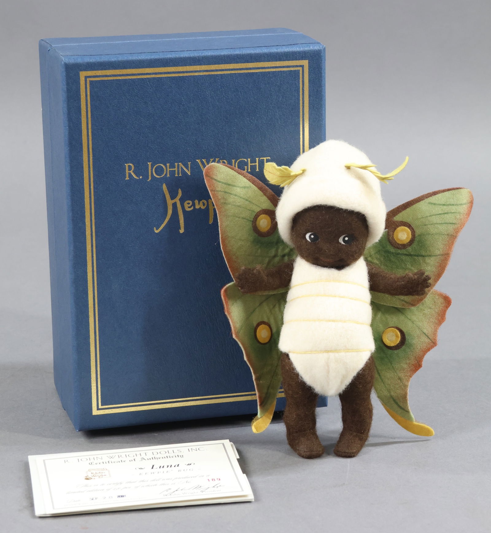 R. JOHN WRIGHT: MIB 7" 2001 Kewpie Bug - "Luna", 189/250, COA. This lot is being sold AS IS.