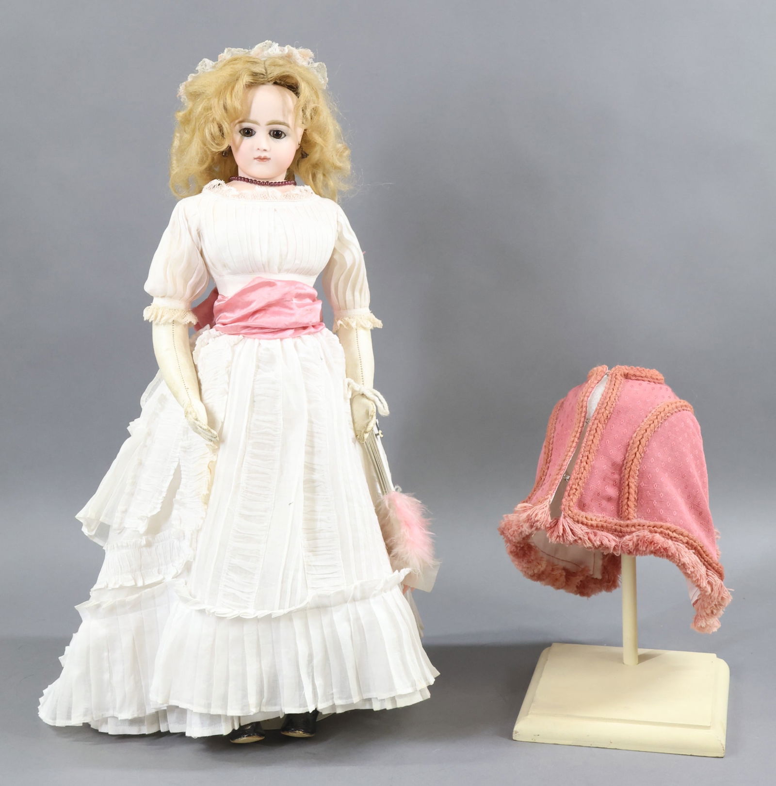 FRENCH BISQUE DOLLS.: 19" "7" French Fashion Doll. Brown paper weight eyes, closed mouth, pierced ears, curly blonde mohair wig, cork pate. Swivel head on a bisque shoulder plate marked "7" on left shoulder. Very clean lea