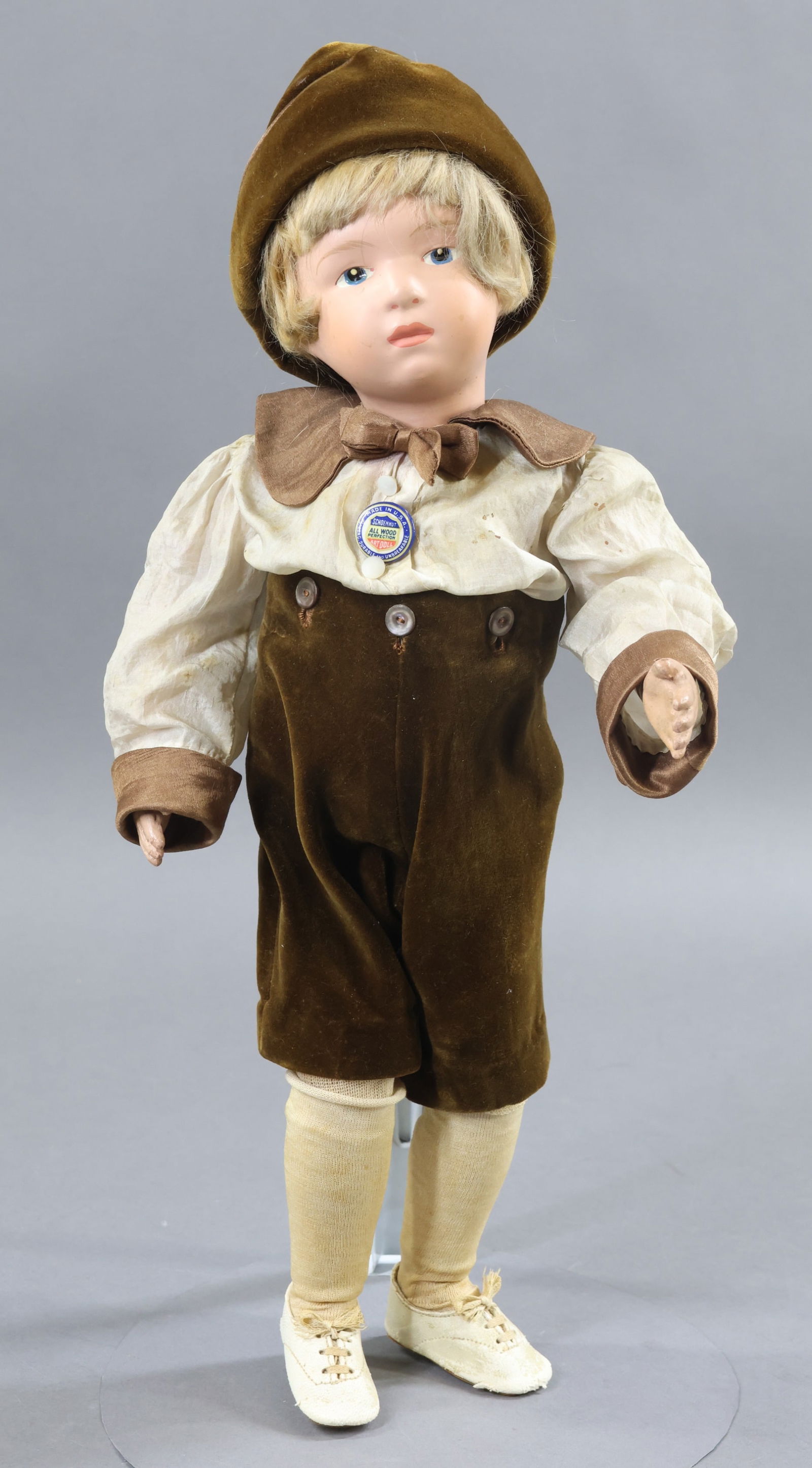 SCHOENHUT.: 16" Model No. 403 (1911-1924) Doll. Blue intaglio eyes, original blonde mohair bobbed wig with bangs. Back of torso has the oval decal. FACTORY ORIGINAL Union suit, socks and ivory leather oxfords. Dr