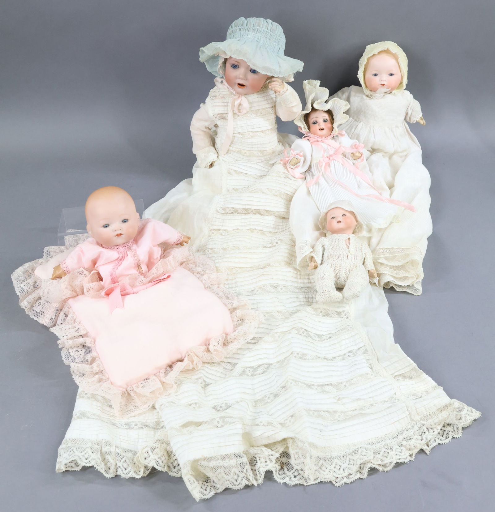 GERMAN BISQUE BABIES.: LOT of (5) dolls. (4) Have sleep eyes, (3) have open mouths, (3) have solid domes with painted hair. 14" G. MADE IN GERMANY 11. 245. J.D.K. 1914 (c) HILDA character baby. Blue eyes, open mouth with wo