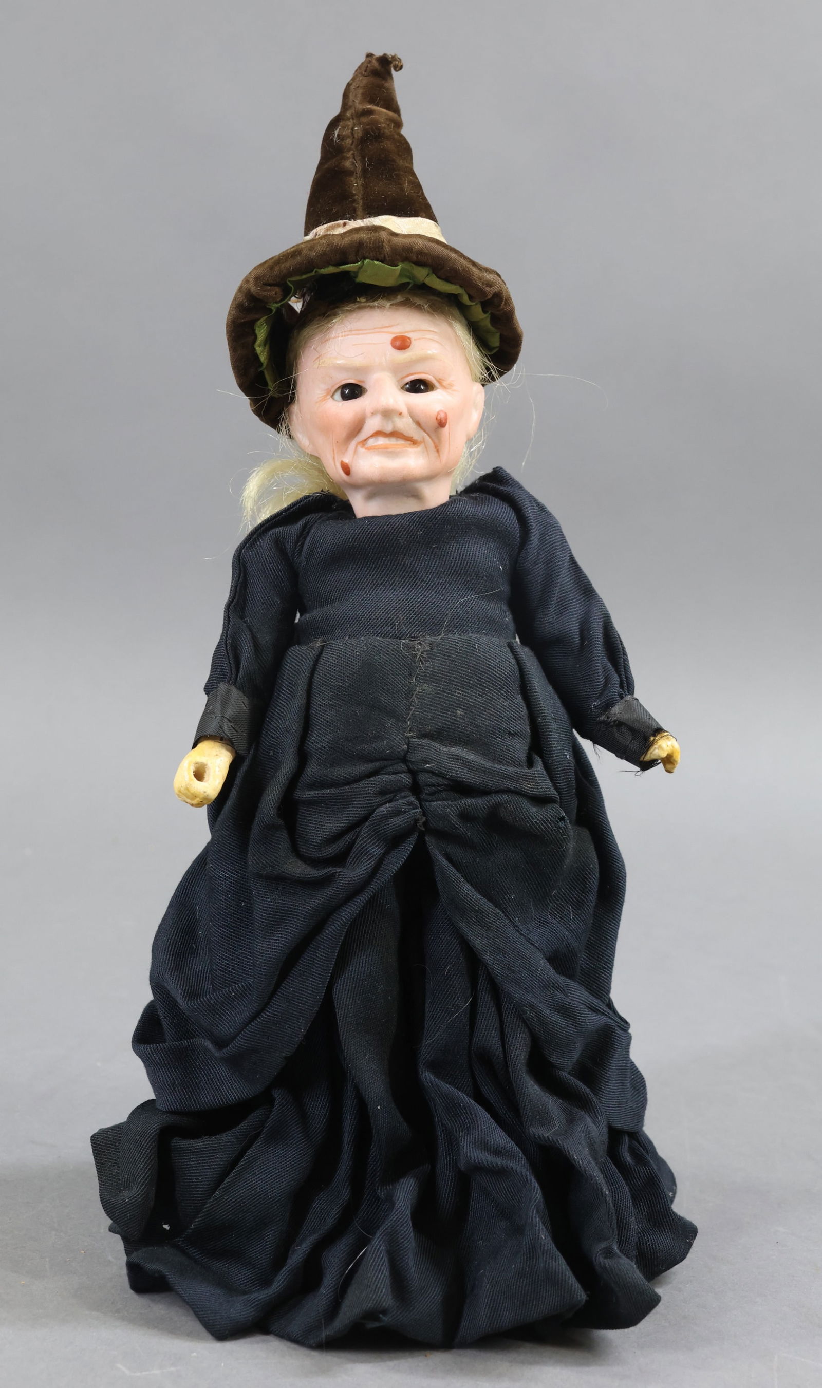 CHARACTER DOLLS.: 9" Bisque head "Hexe The Witch" Doll marked HEXE 5/0 (one of the Dressel "Portrait Series" Dolls). Stationary black glass eyes, molded painted features. Painted wrinkles, warts. Open/closed mouth with