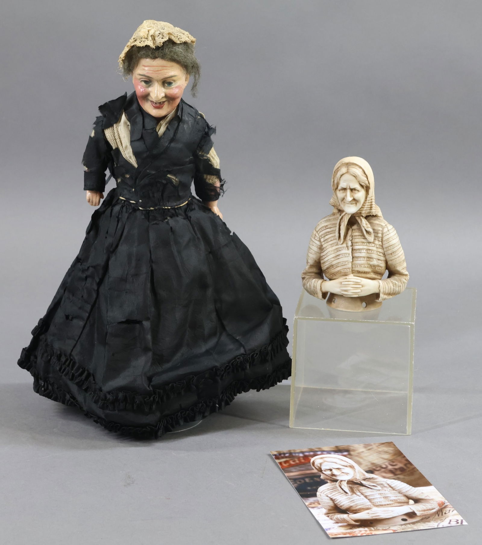 CHARACTER DOLLS.: LOT. Doll 1) 11" Unmarked papier mache shoulder head doll with painted, molded features. Grey mohair wig. Open/closed mouth showing teeth. Cloth body with papier mache lower arms and legs. Dressed in