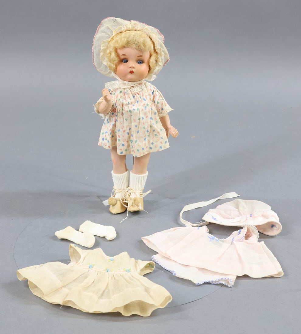 GERMAN BISQUE DOLLS 12" UNDER.: LOT. 8" JUST ME Registered GERMANY A.310/11/0.M. Doll with painted bisque head, blue side glance sleep eyes, closed mouth, curly blonde mohair wig. 5 Pc. papier mache body. She comes with original tag