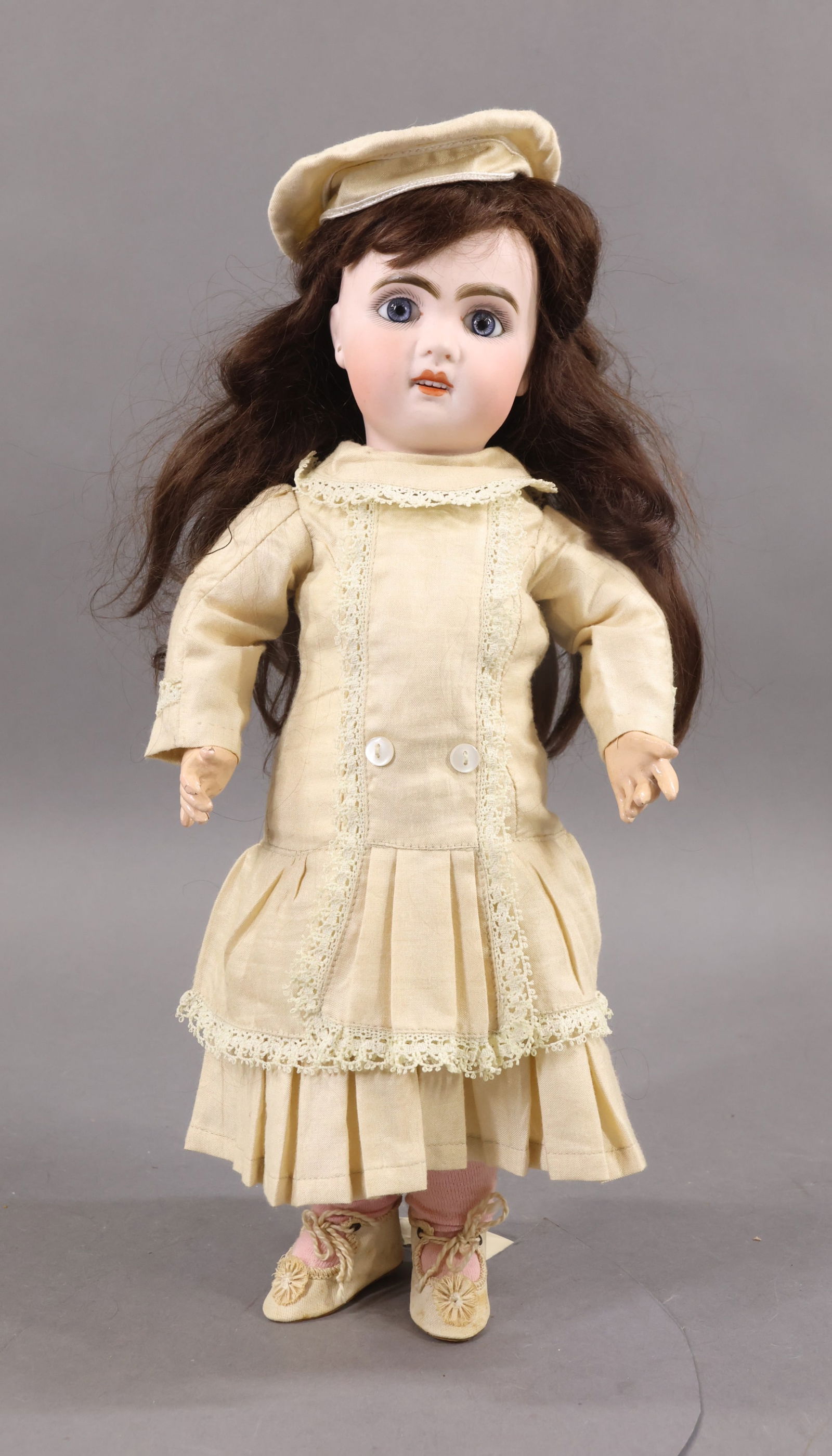 ANTIQUE FRENCH BISQUE HEAD DOLL.: 14 1/2" (Red stamp) TETE JUMEAU (incised) 5 Doll with blue paperweight eyes, open mouth, pierced ears, dark brown KEMPER mohair wig, molded pate. Papier mache jointed body (marked with oval paper labe