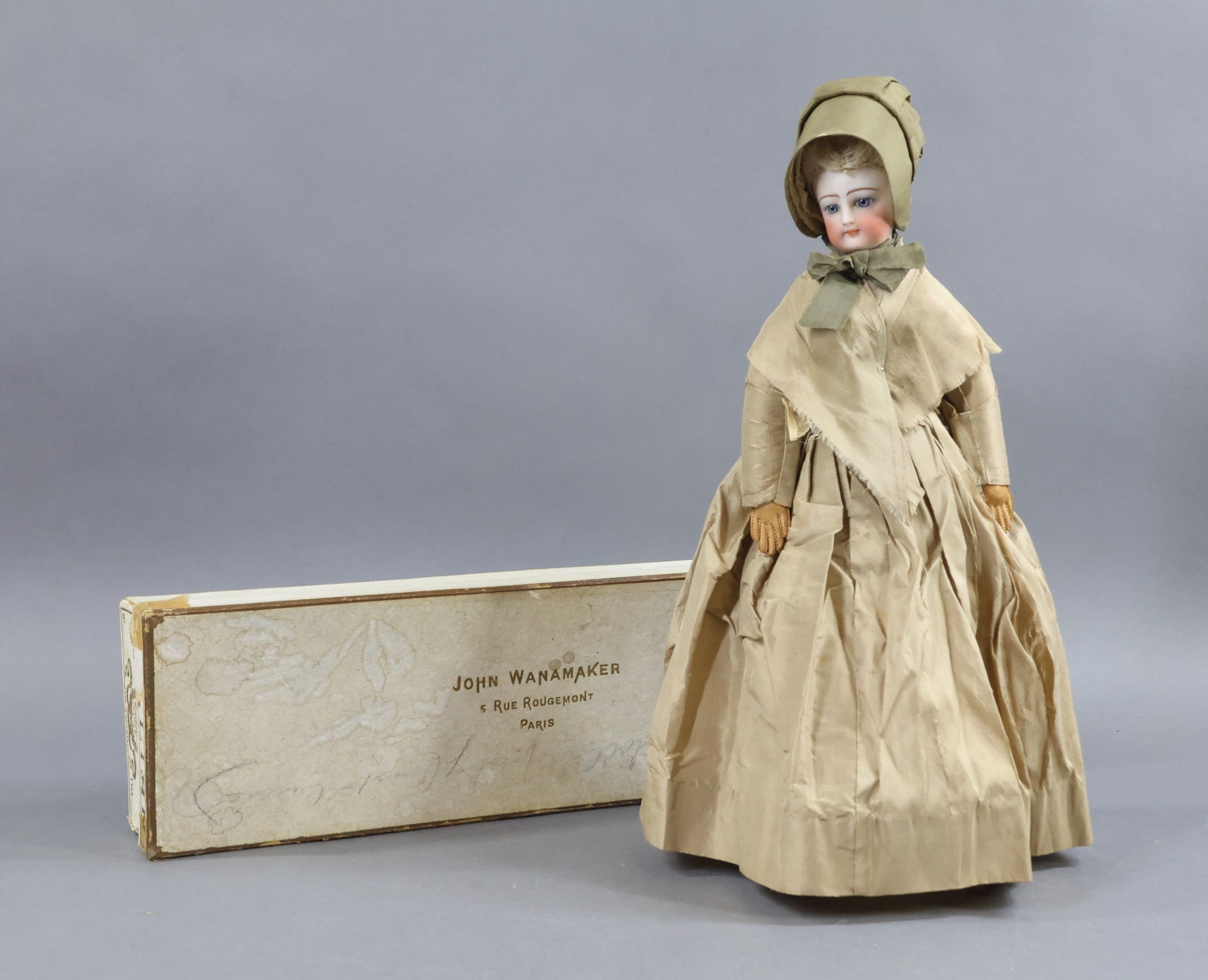 ANTIQUE FRENCH BISQUE HEAD FASHION DOLL.: LOT. 14" "Susanna". Unmarked very pretty socket head doll with nice cheek coloring. Separate bisque shoulder plate. Blue paperweight eyes, closed mouth, pierced ears, blonde mohair wig with bun at nap