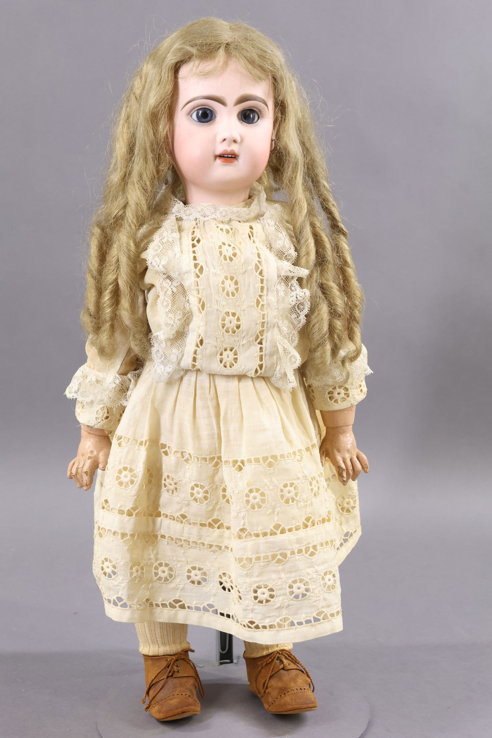 ANTIQUE FRENCH BISQUE HEAD DOLL.: 21" (Red stamp) DEPOSE TETE JUMEAU 9 Doll with blue sleep eyes, open mouth, pierced ears, long curly honey blonde HH wig, cork pate. Original wood/metal spring in head. Papier mache jointed body is ma