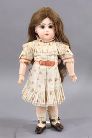 ANTIQUE FRENCH BISQUE HEAD DOLL.