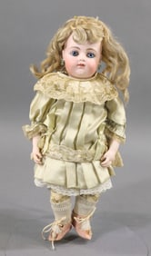 ANTIQUE FRENCH BISQUE HEAD DOLL.