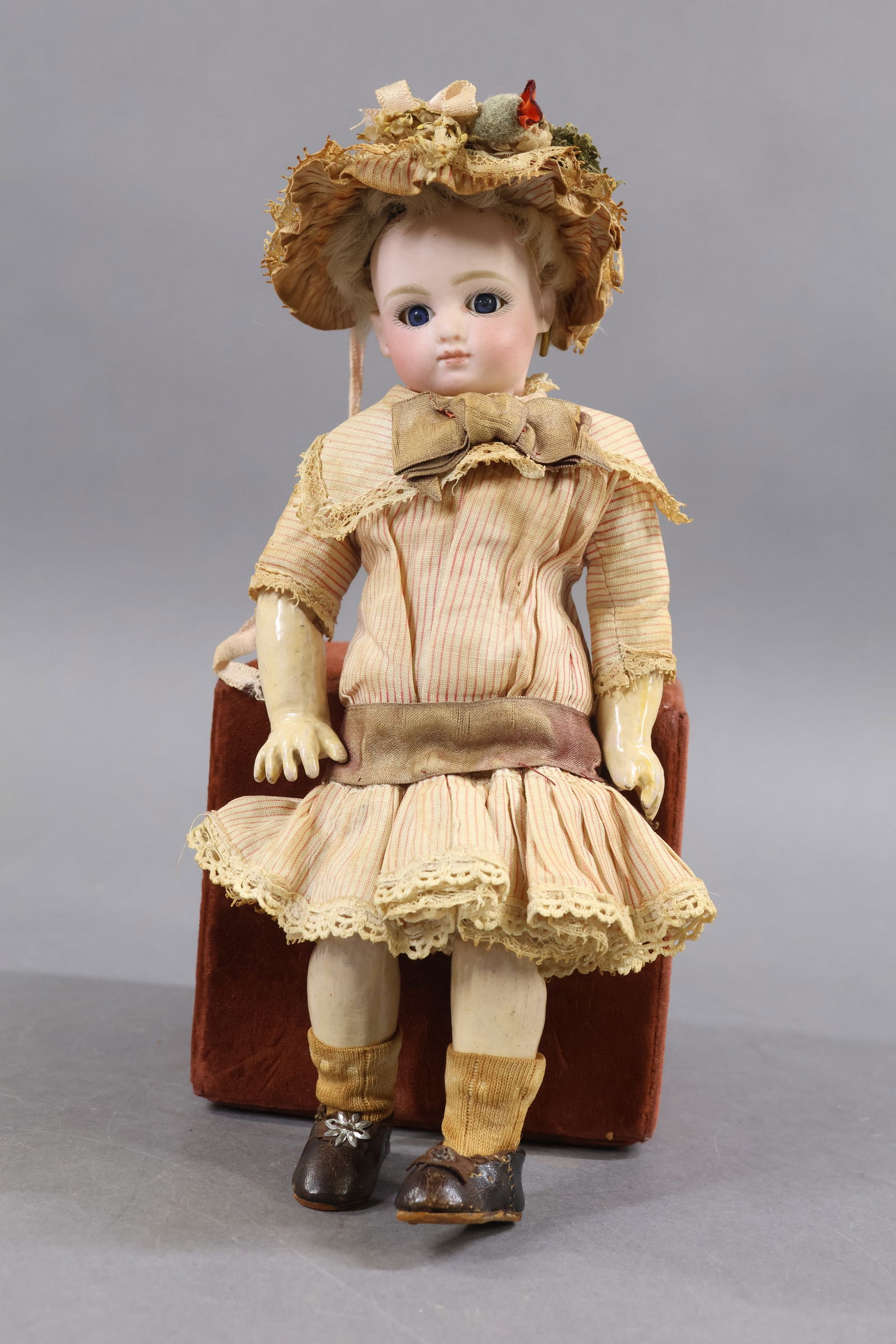 ANTIQUE FRENCH BISQUE HEAD DOLL.: 8 1/2" (incised) Sie C 4/0, (red penned) T. STEINER Bte S.G.D.G. T. Bourgoin S. on back of head (under incised mark). Head has the lever action eye mechanism. Blue sleep eyes, closed mouth, pierced ea