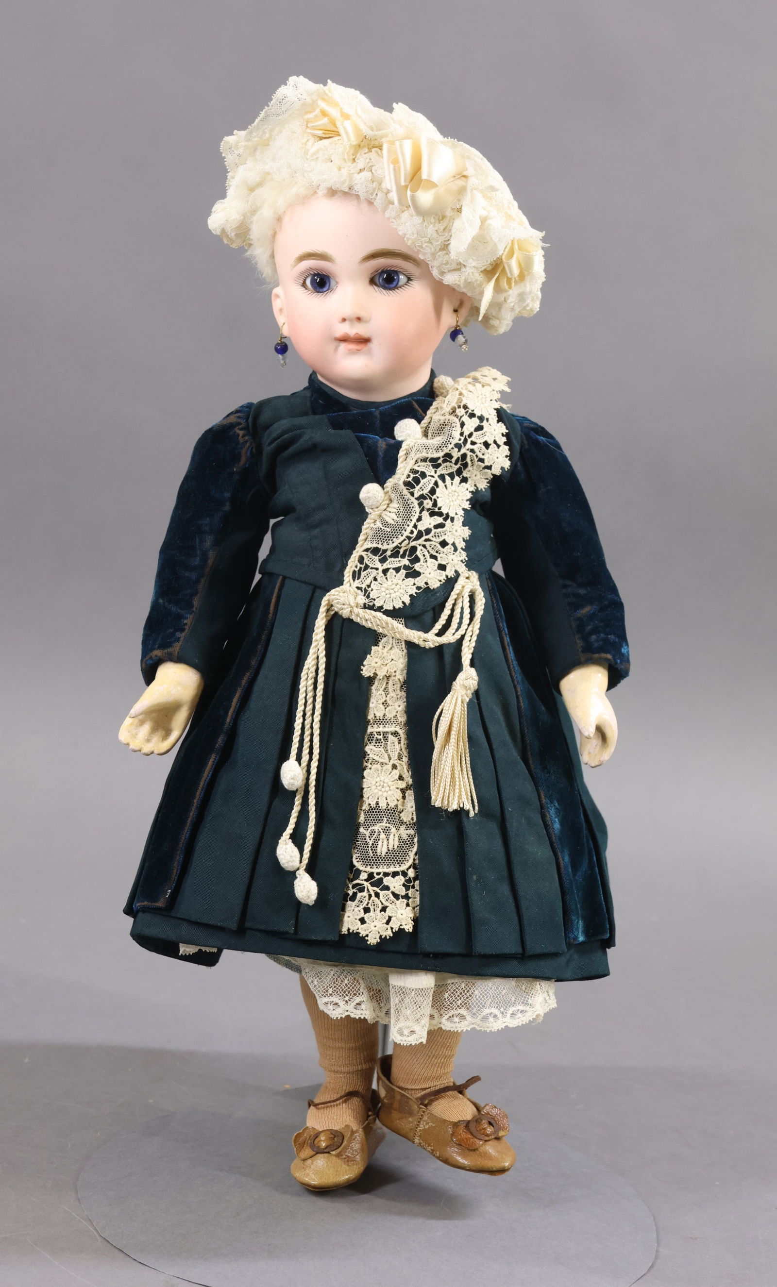 ANTIQUE FRENCH BISQUE HEAD DOLL.: 14 1/2" (Incised) SCH 1 (SCHMITT OF PARIS) Doll. Blue paperweight eyes, closed mouth (with space between lips), pierced ears, short white fur wig, cork pate. Papier mache jointed body with straight wr