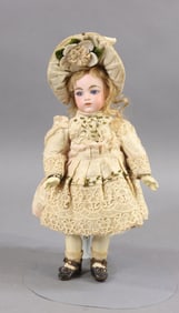 ANTIQUE FRENCH BISQUE HEAD DOLL.