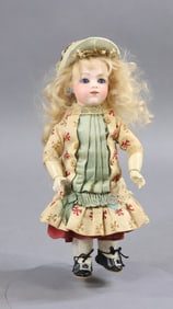 ANTIQUE FRENCH BISQUE HEAD DOLL.